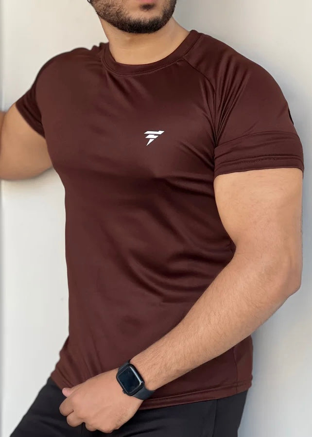 BROWN DOMINATE YOUR WORKOUTS WITH LYCRA'S SHIRT'S SEAMLESS DESIGN