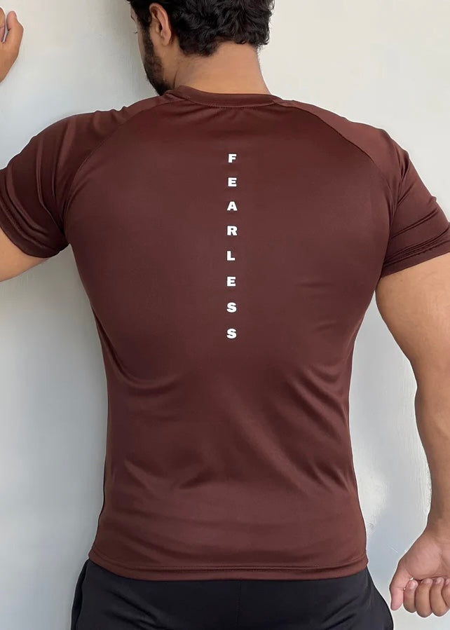 BROWN DOMINATE YOUR WORKOUTS WITH LYCRA'S SHIRT'S SEAMLESS DESIGN