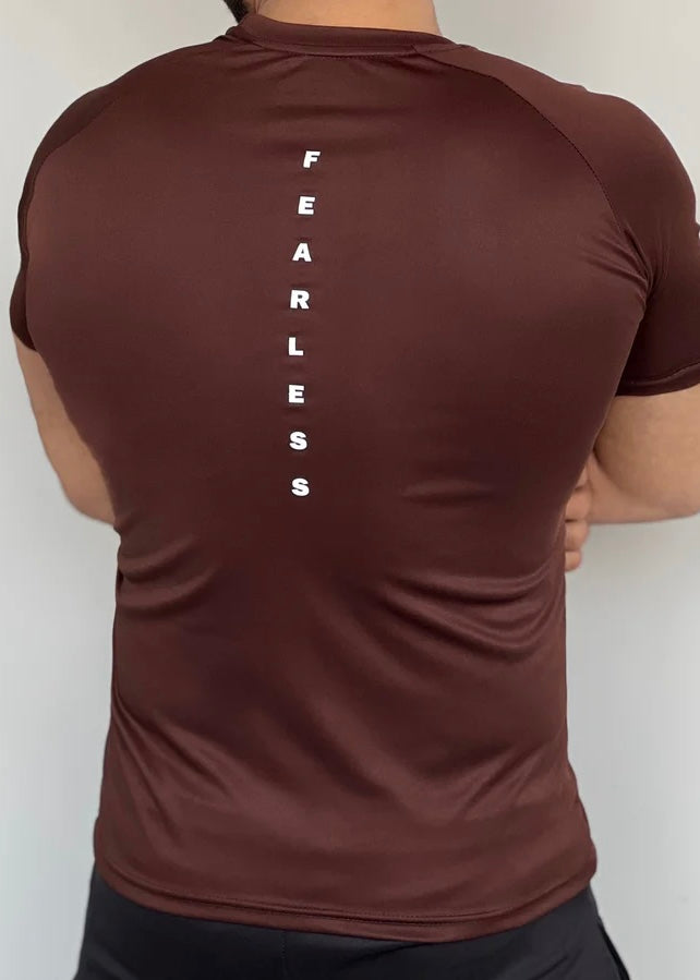 BROWN DOMINATE YOUR WORKOUTS WITH LYCRA'S SHIRT'S SEAMLESS DESIGN